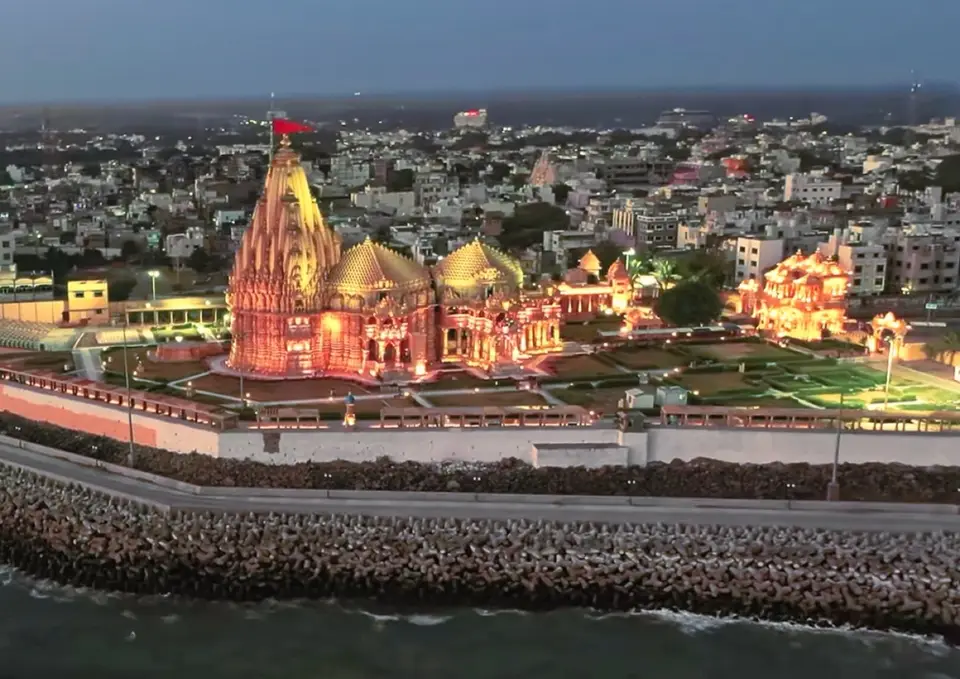 Somnath temple lit at dusk, seen from the air