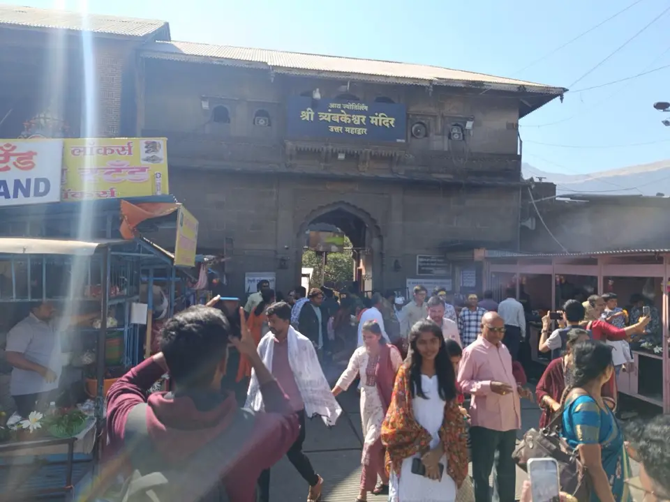 Entrance gate of Trimbakeshwar temple with the market in front